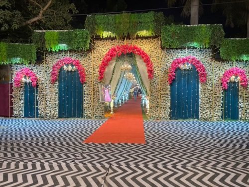 Royal Wedding Gate With Red Carpet And Flower Arches – Phule Weddings