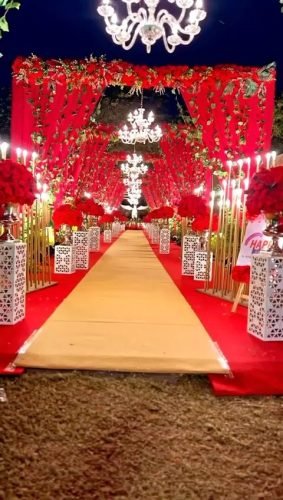Luxury Passageway With Crystal Chandeliers And Flowers – Phule Weddings