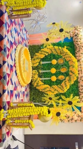 Haldi Ceremony Home Decoration With Flowers – Phule Weddings