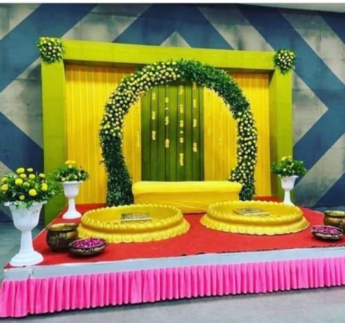 Mehndi Function Decoration With Green And Yellow Theme Drapes | Phule Weddings