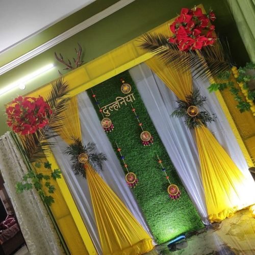 Modern Mehndi Decoration With Fairy Lights And Flower Arch | Phule Weddings