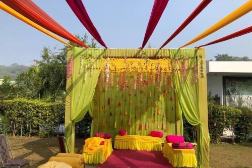 Outdoor Mehndi Ceremony Decoration With Marigold Flowers And Stage Setup | Phule Weddings