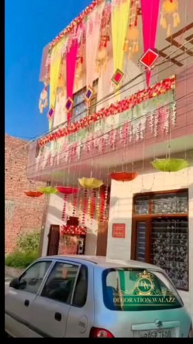 Wedding Home Entrance Decoration With Floral Toran And Lights | Phule Weddings