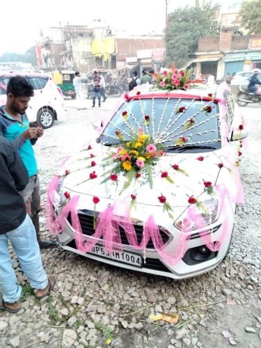 Red Car Wedding Decoration With Roses, Drapes, And Floral Arch | Phule Weddings
