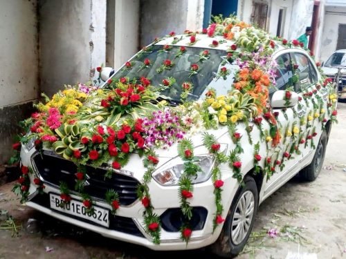 Elegant Car Decoration With Marigold Garlands And Lights | Phule Weddings