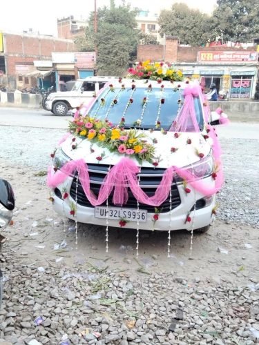 Traditional Car Decoration For Wedding With Yellow Marigolds | Phule Weddings
